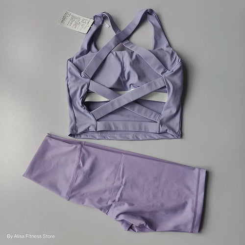 Lavender 2 piece workout outfit featuring a stylish crop top and matching leggings from The Lady's Haven Boutique