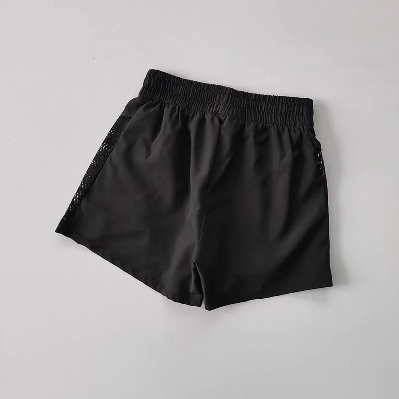 Black breathable gym shorts for women with elastic waistband for comfortable workouts