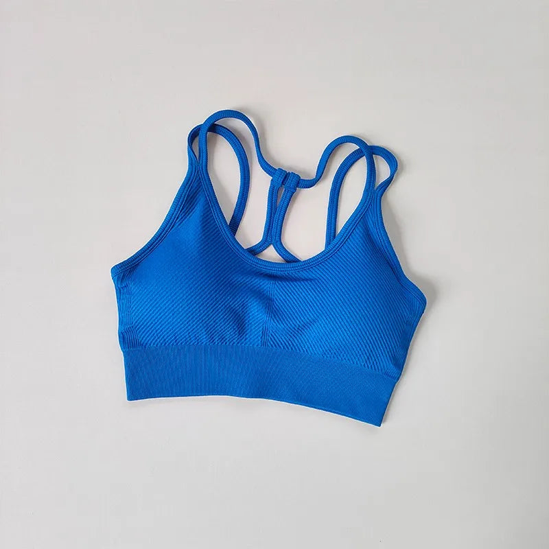 Blue breathable sports bra for women with stylish crisscross back design
