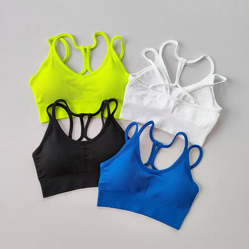 Breathable sports bra for women available in black, blue, white, and neon yellow colors