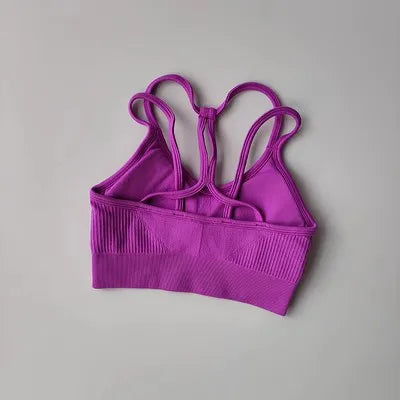 Purple breathable sports bra for women with stylish crisscross back design