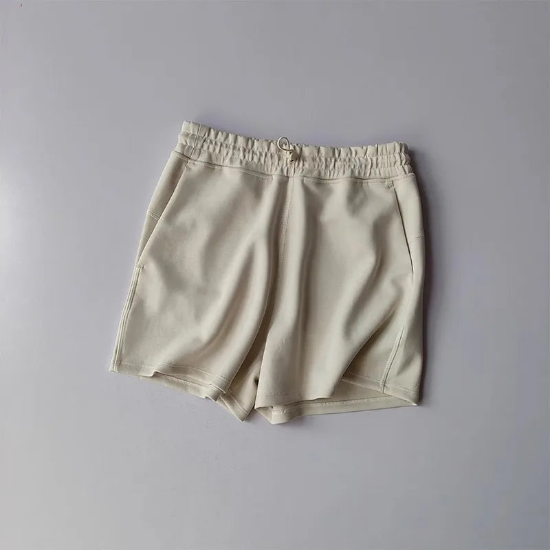Light beige Casual Sports Shorts for Women with elastic waistband and side pockets
