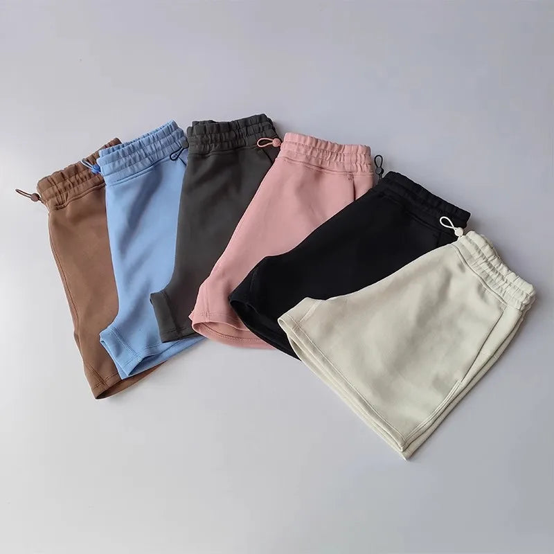 Casual Sports Shorts for Women in various colors including blue, pink, black, beige, and brown