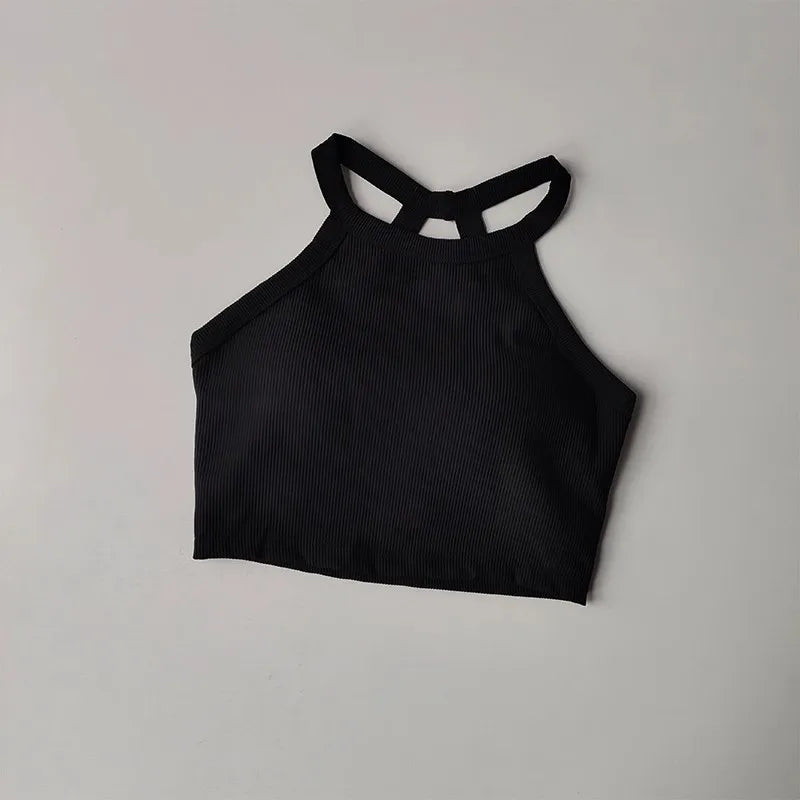 Black gym top fitness camisole with a stylish crisscross design for comfortable workouts