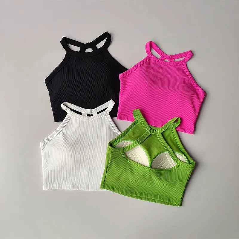 Set of four gym top fitness camisole in black, white, pink, and green with stylish ribbed design