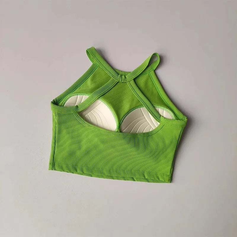 Green gym top fitness camisole with unique cut-out design for stylish workouts