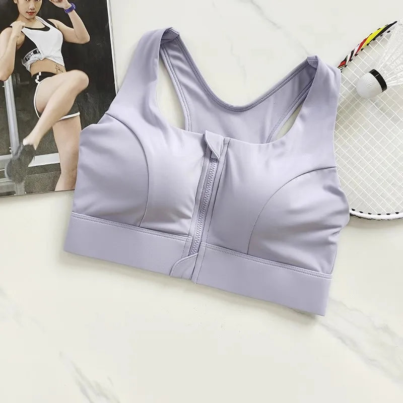 Light purple high impact sports bra for women with front zipper for support during workouts