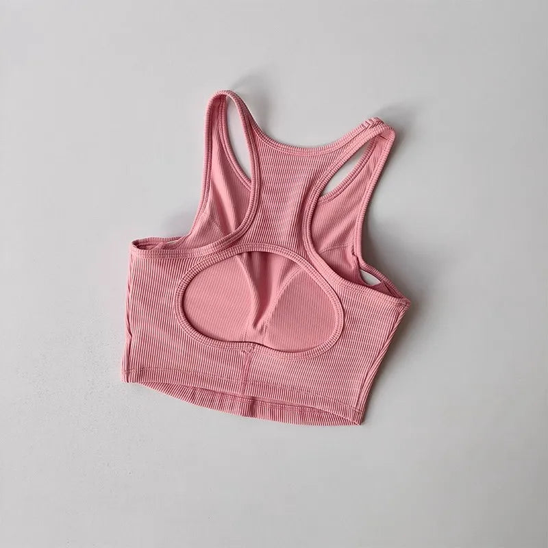 Pink high impact sports bra for women with breathable fabric and racerback design