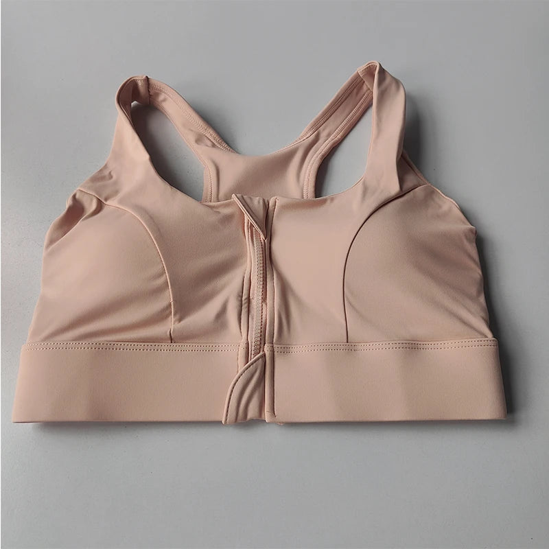 Peach high impact sports bra for women with front zipper closure and supportive design