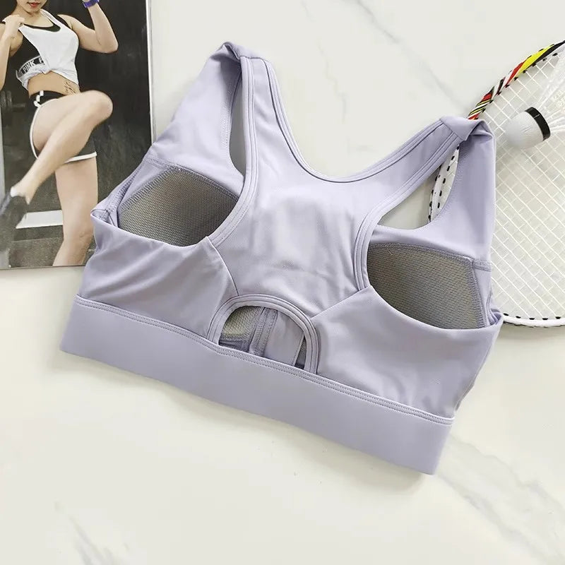 Light purple high impact sports bra for women with mesh panels for breathability and support