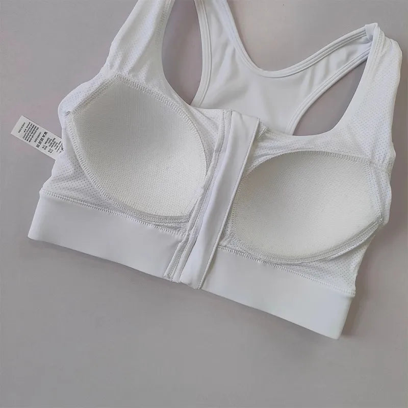 White high impact sports bra for women with adjustable straps and supportive design for workouts