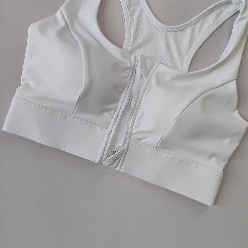 White high impact sports bra for women with zip closure and mesh panels for breathability