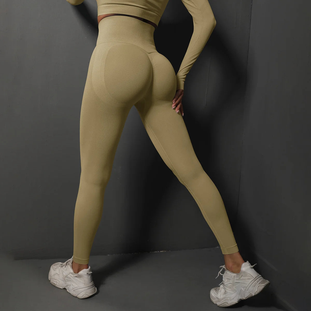 High waist seamless yoga leggings in light beige, designed for comfort and flexibility during workouts