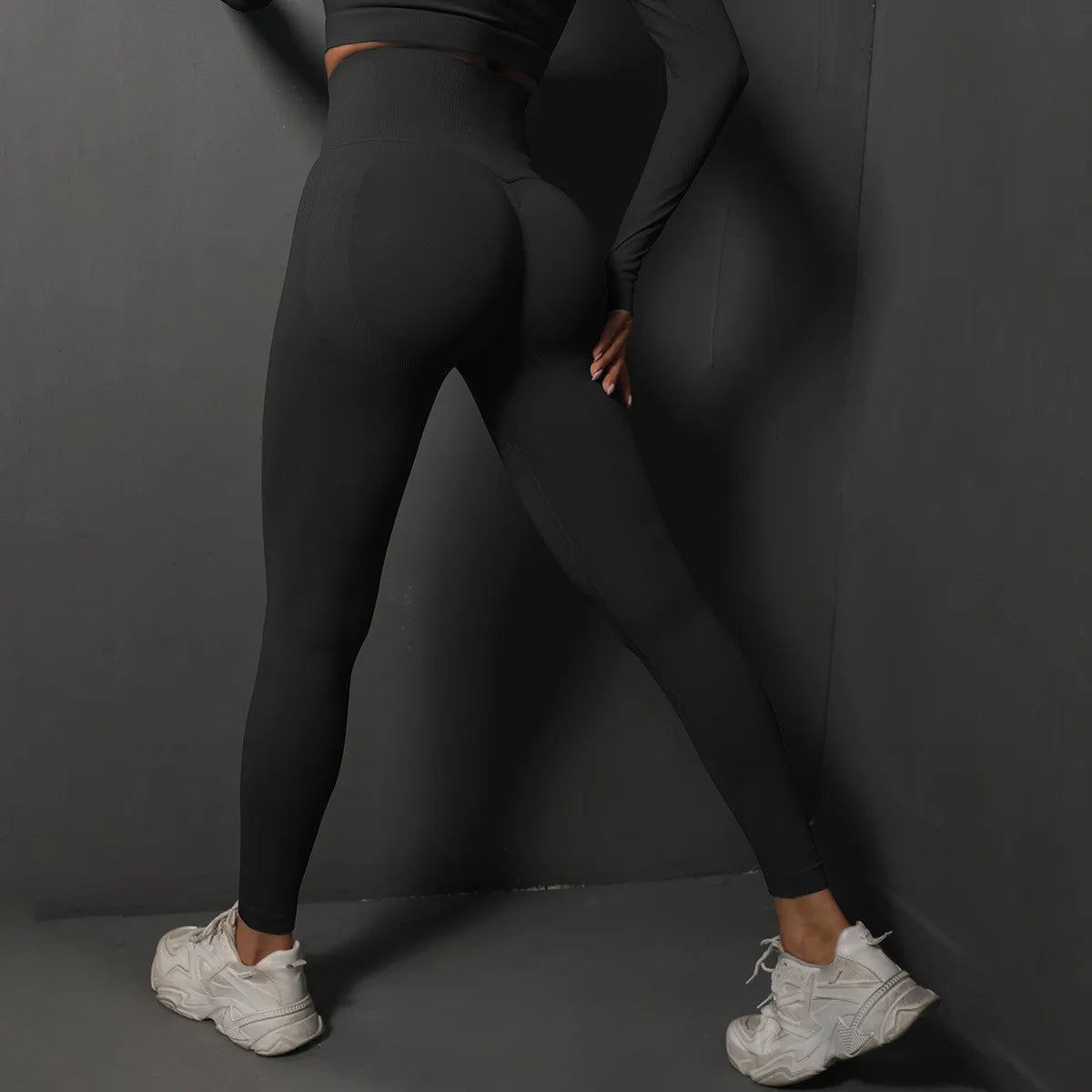High waist seamless yoga leggings in black with form-fitting design for comfortable workouts