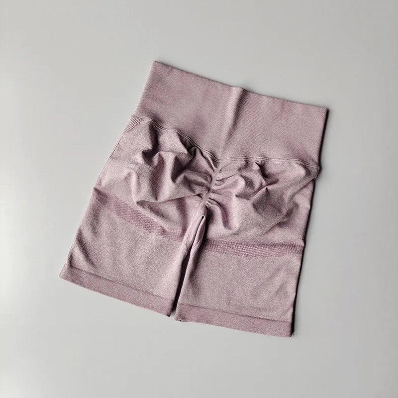 High waist seamless yoga shorts in soft lavender color with a stylish design and comfortable fit
