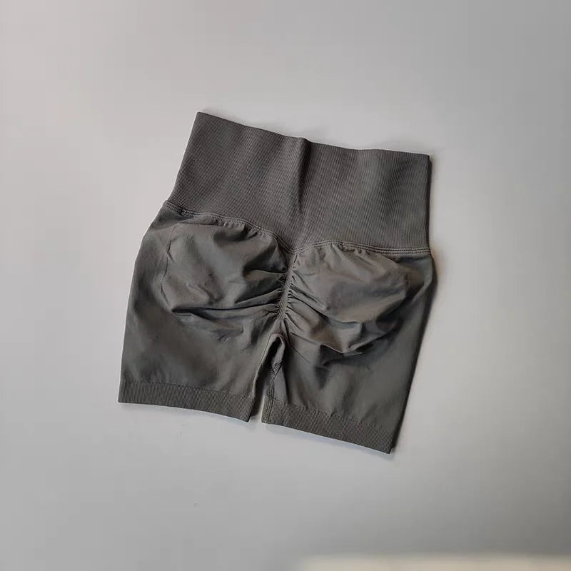 High-waist yoga shorts women in gray with stylish ruched design for comfort and flexibility