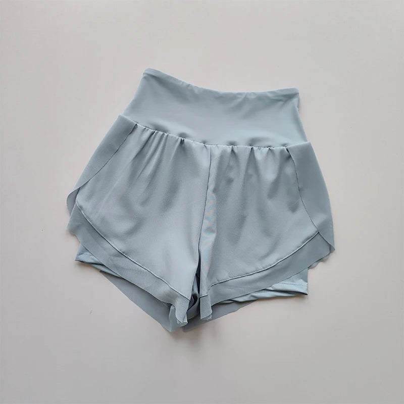 Light blue high-waisted sports shorts women with a comfortable fit for active wear