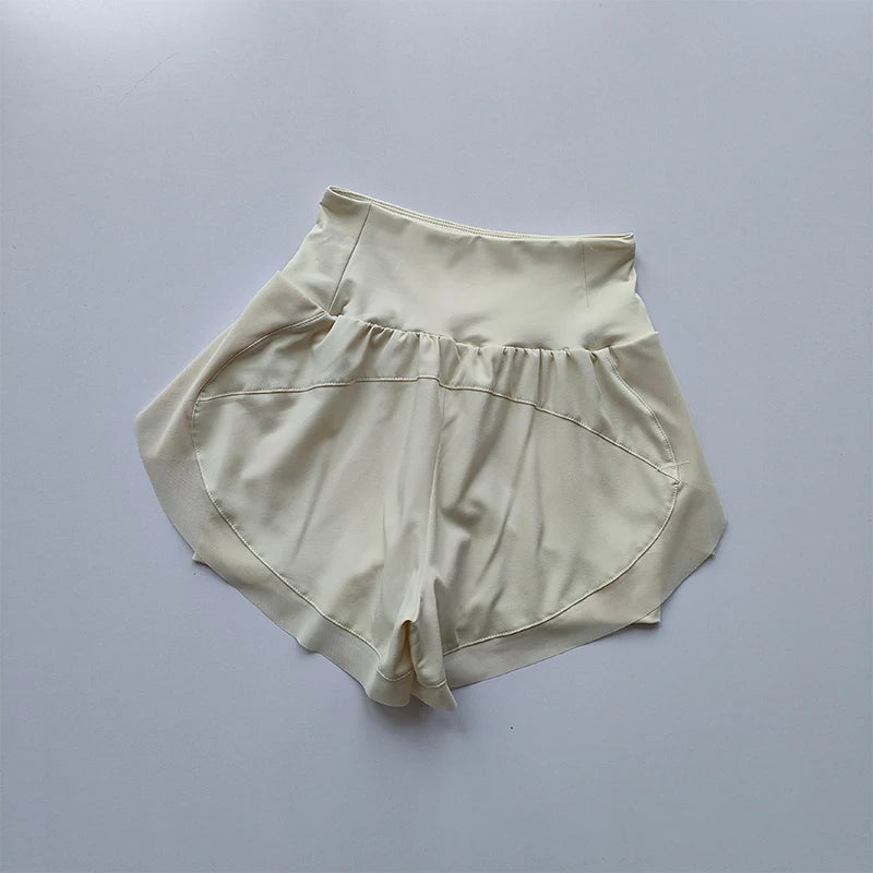 Beige high-waisted sports shorts women with a comfortable fit for workouts and casual wear
