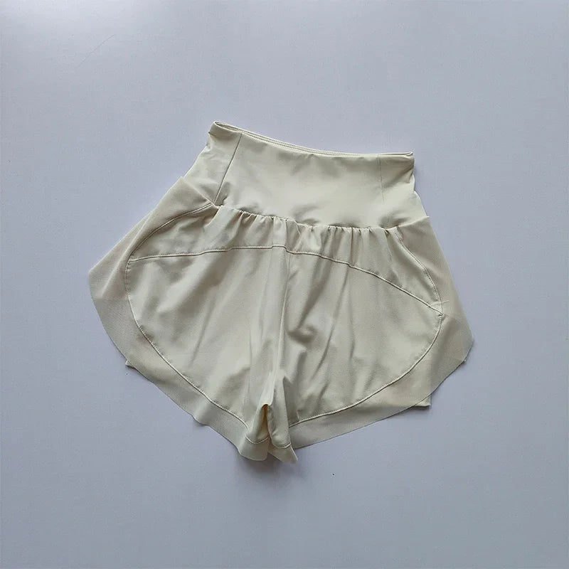 Cream high-waisted sports shorts women with a comfortable and stylish design for active lifestyles