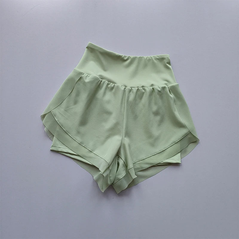 Light green high-waisted sports shorts women with a layered design for comfort during workouts