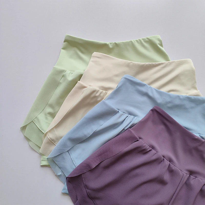 High-waisted sports shorts women in pastel colors suitable for workouts and casual wear