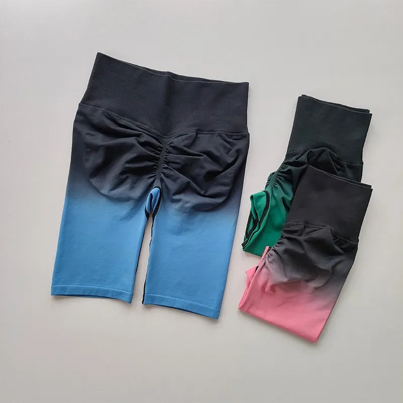 Ladies high waist running shorts in blue, black, green, and pink with stylish gathered design