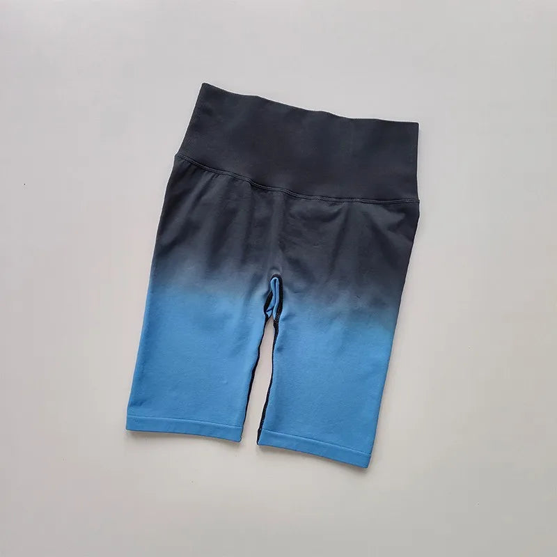 Ladies high waist running shorts in black and blue ombre design for comfortable workouts