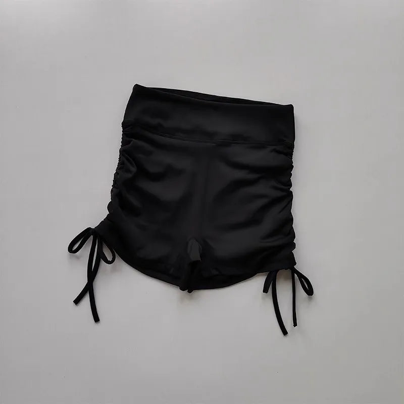 Black ladies high waist workout shorts with adjustable side ties for a comfortable fit
