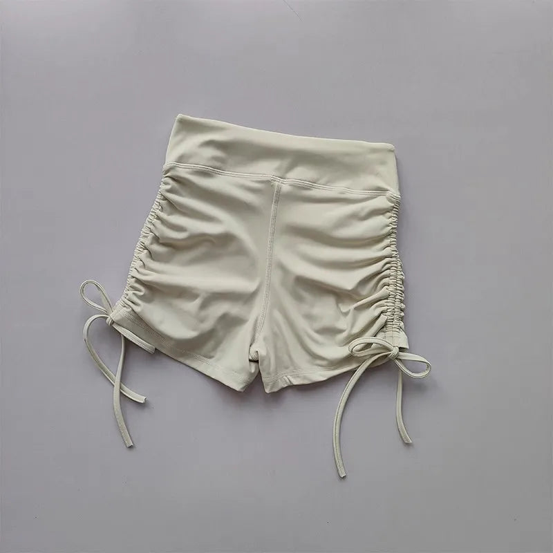 Cream Ladies High Waist Workout Shorts with Adjustable Side Ruching for Comfort and Style