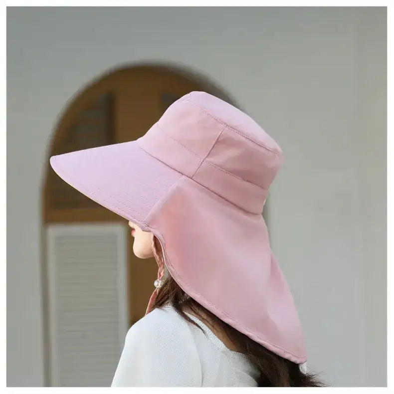 Ladies UV sun protection bucket hat in pink, designed for stylish sun safety
