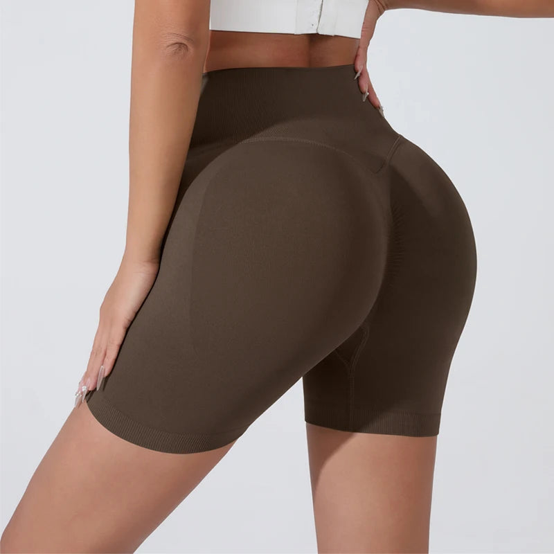 Brown push-up gym shorts for women with a high waist and accentuating fit for workouts