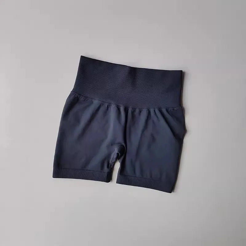 High-waist push-up gym shorts for women in dark color, perfect for workouts and training