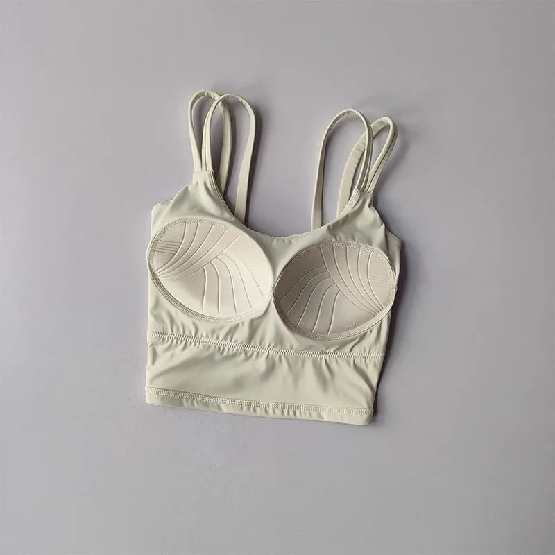 Cream-colored push up sports bras for women with stylish design and comfortable fit