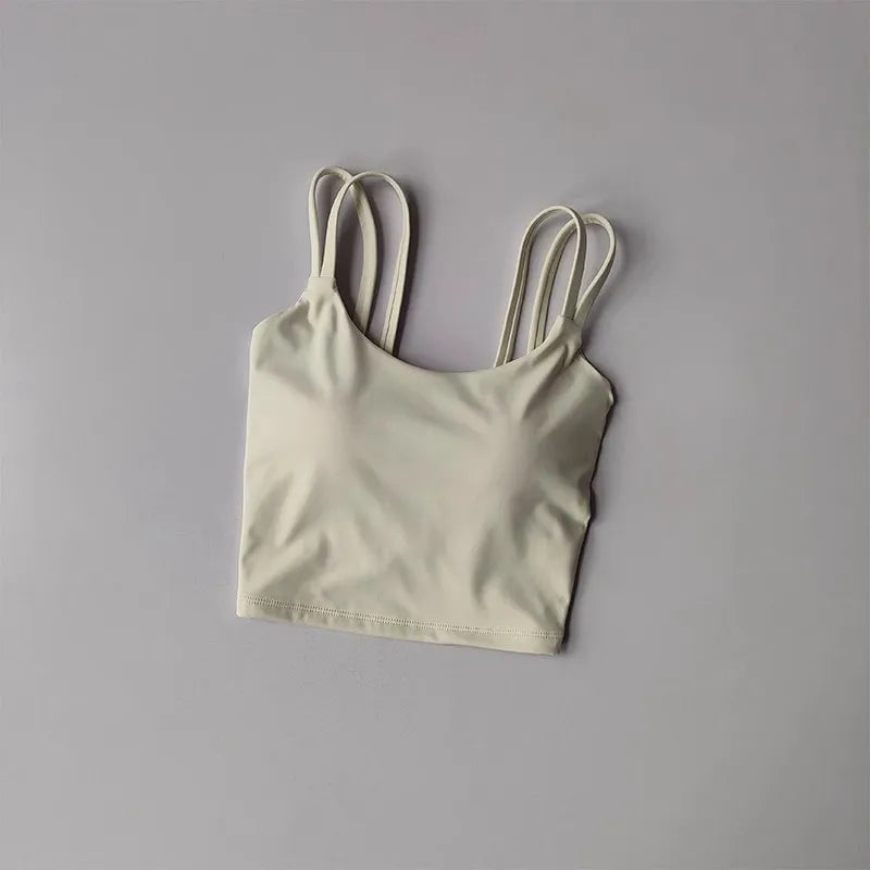 Light beige push up sports bras for women designed for comfort and support during workouts
