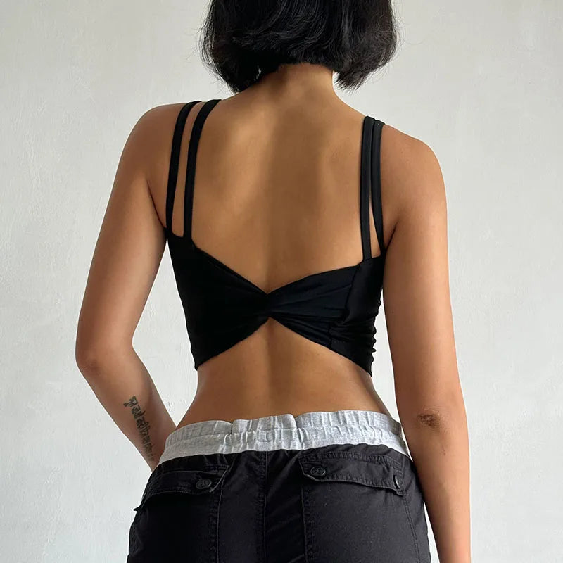 Back view of a stylish black crop top, ideal as push up sports bras for women.