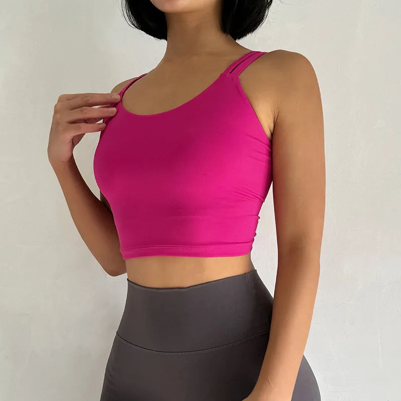 Pink push up sports bras for women with adjustable straps and cropped design for comfort and style