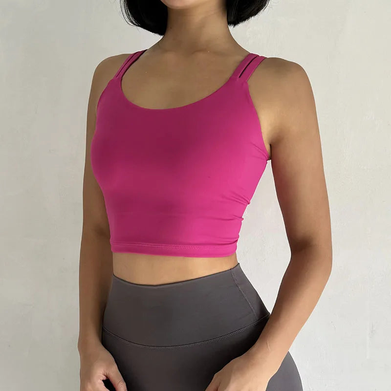 Pink crop top featuring adjustable straps, ideal push up sports bras for women during workouts