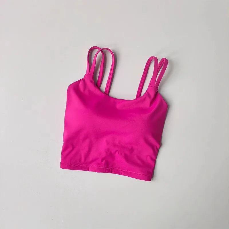 Bright pink push up sports bras for women with adjustable straps for added support and comfort