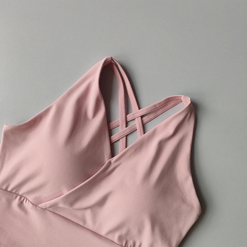 Stylish pink shockproof crop top for women with strappy design perfect for active wear