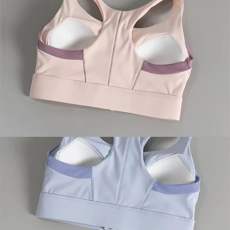 Shockproof padded gym bra for women in pink and blue with breathable design for comfort and support