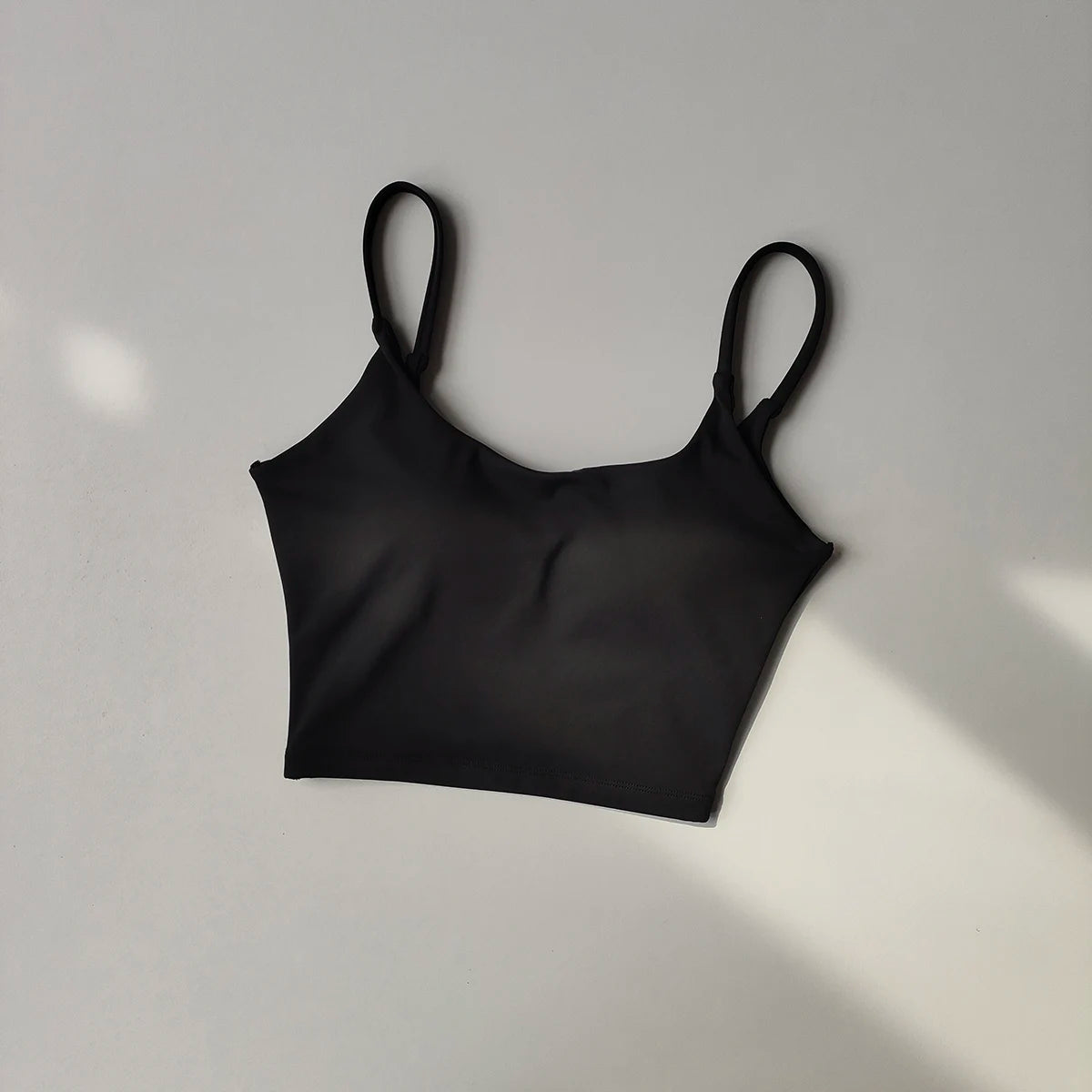 Black sports underwear for ladies with adjustable straps for comfortable support during workouts