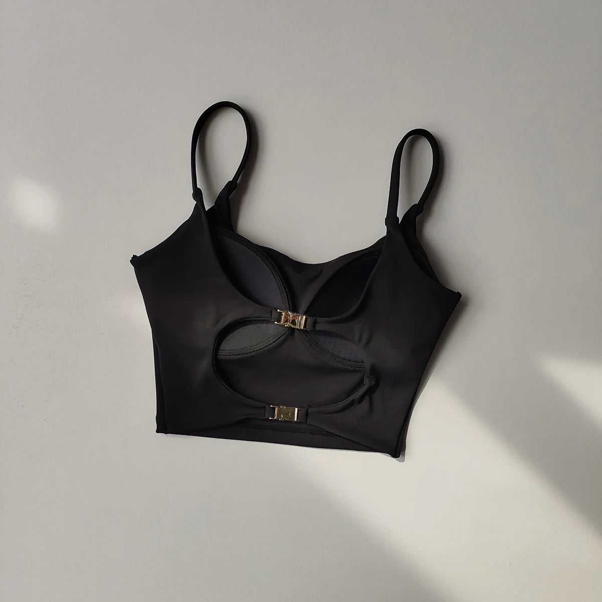 Black cutout sports underwear for ladies with adjustable straps and comfortable fit
