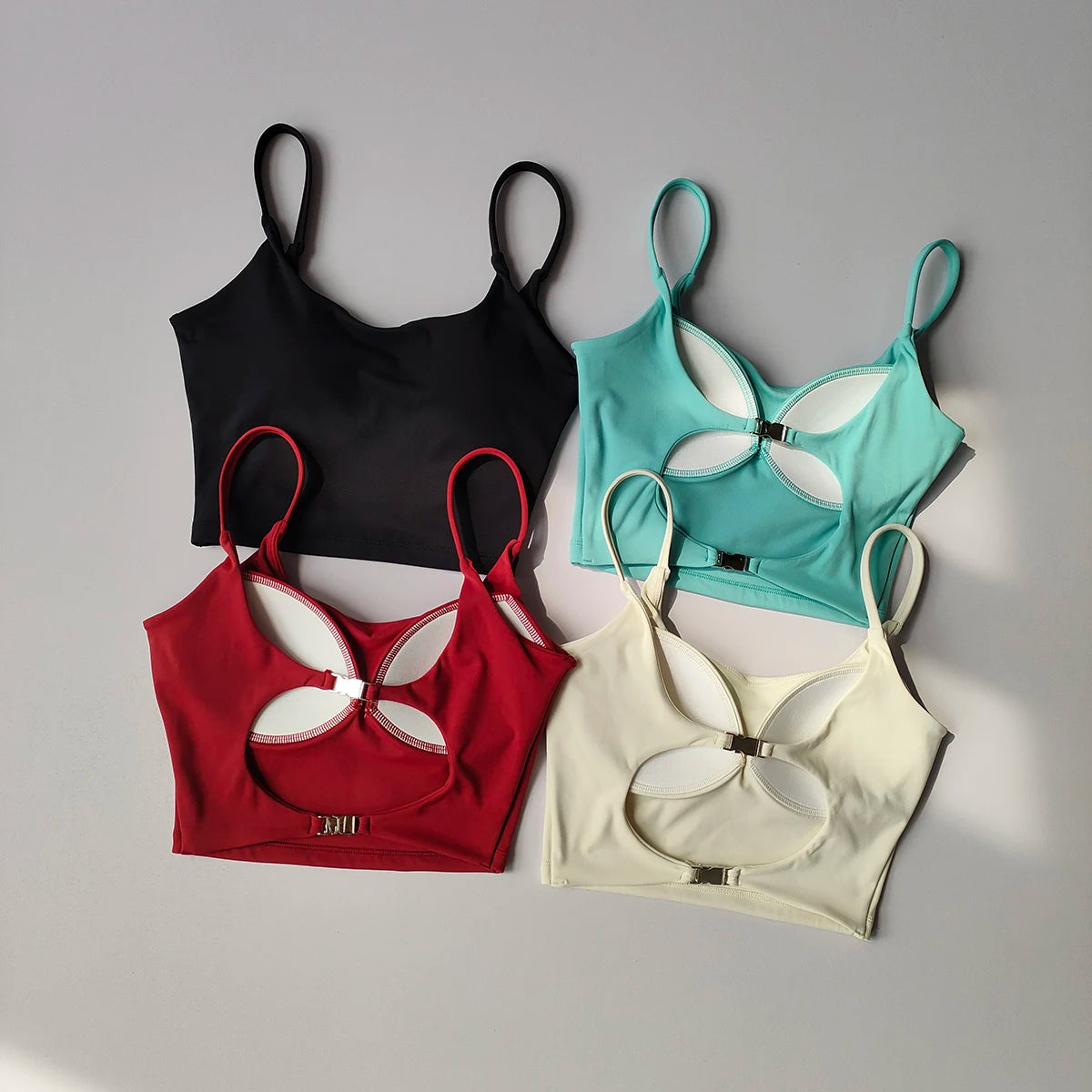Assorted colors of sports underwear for ladies featuring stylish cut-outs and adjustable straps