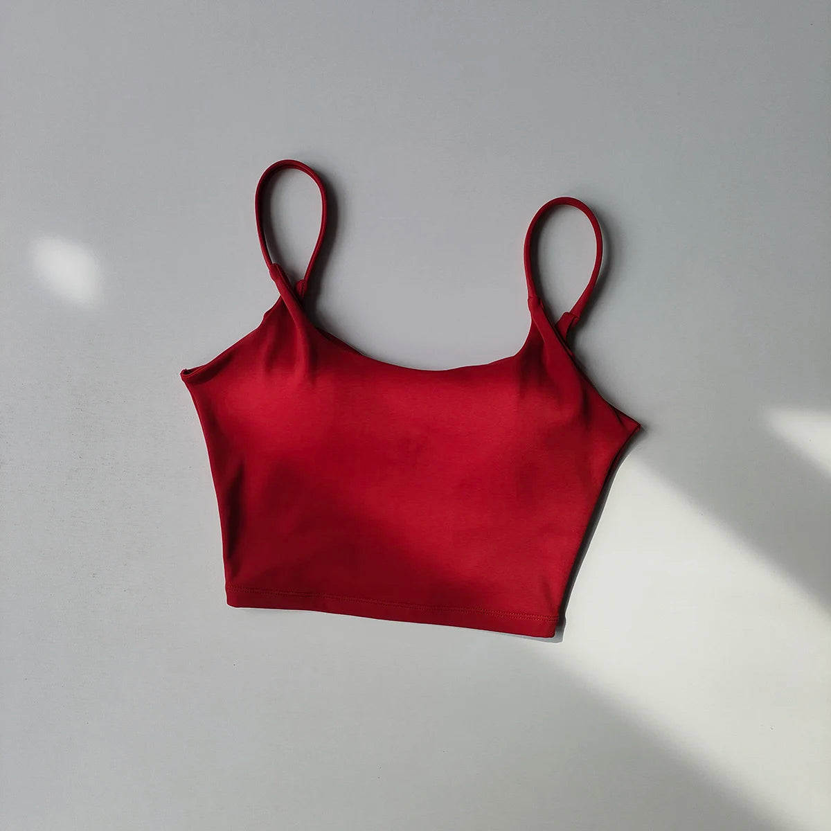Red crop top for women, ideal for comfortable sports underwear for ladies during workouts
