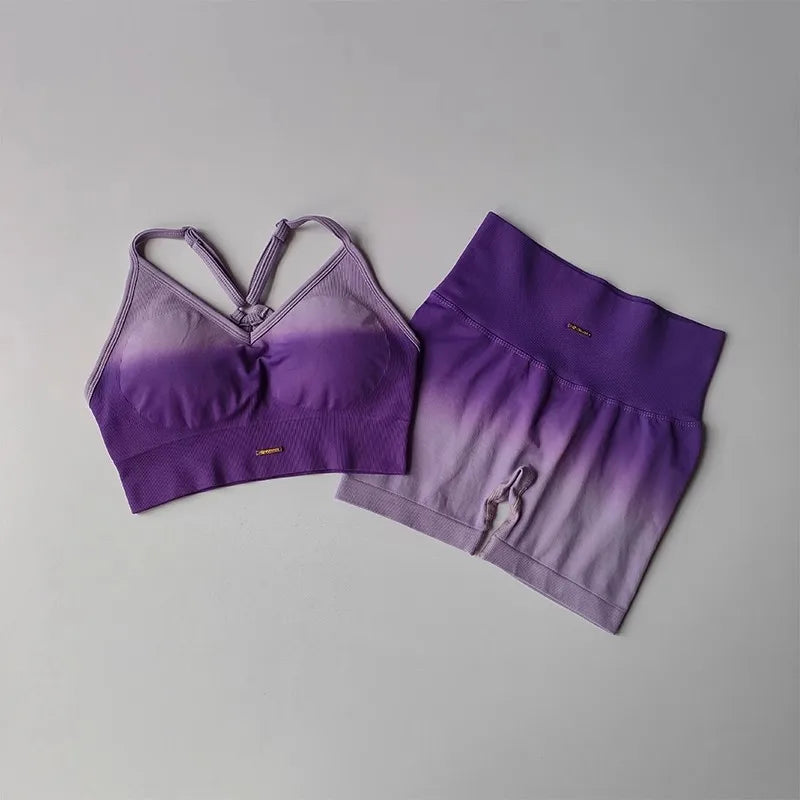 Purple two piece athletic wear set for women featuring a stylish sports bra and matching shorts