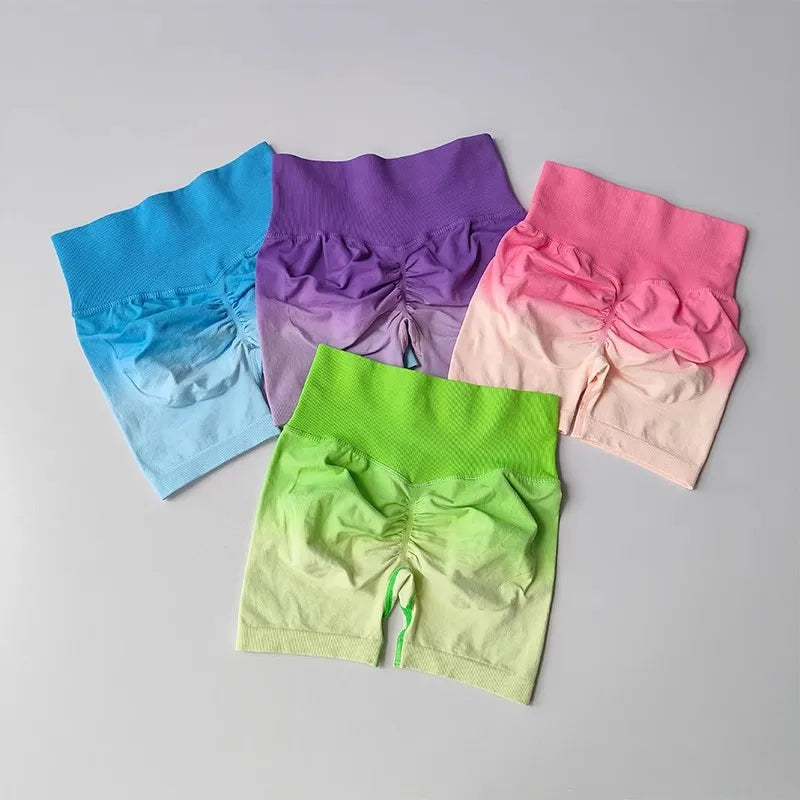 Colorful two piece athletic wear set for women featuring vibrant mesh shorts in blue, purple, pink, and green