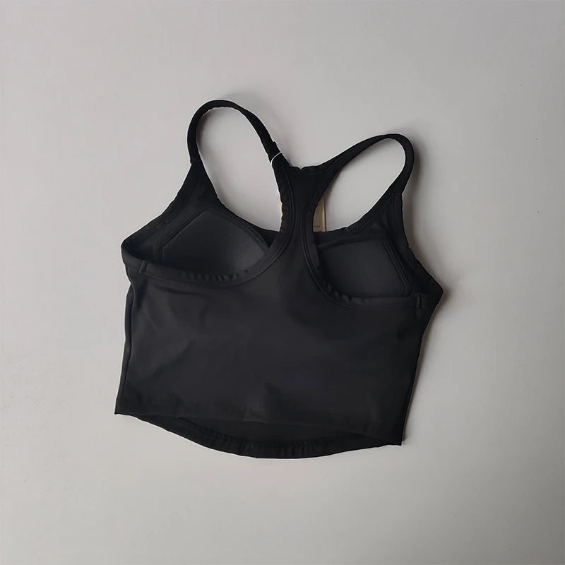 Black womens push up sports bra with adjustable straps for comfort during workouts