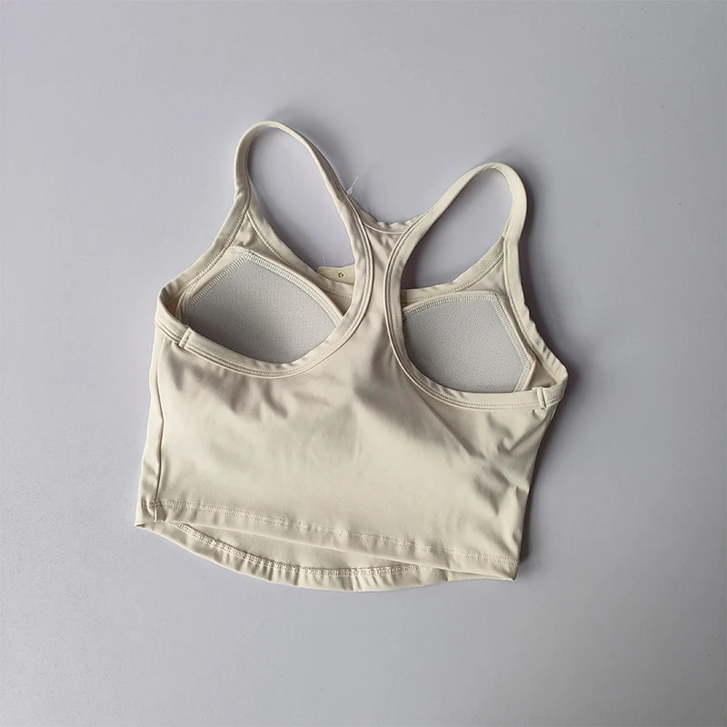 Light beige womens push up sports bra with breathable mesh back and supportive design