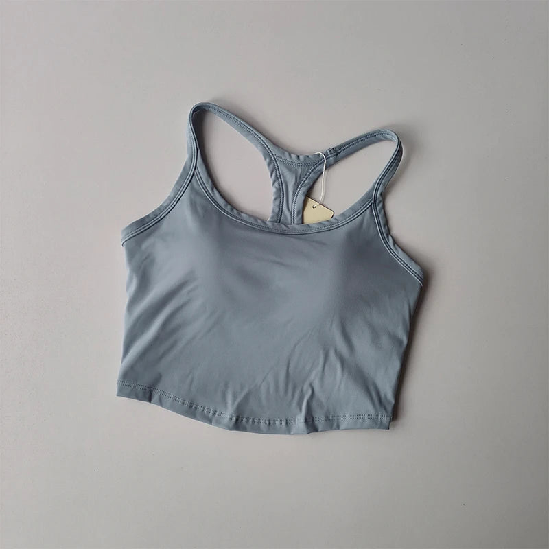 Light blue womens push up sports bra with a racerback design for active support and comfort